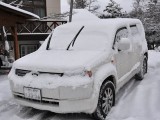 車に積もった雪